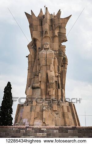 Stock Photograph - Structure with statues of human likeness; Dolores Hidalgo, Guanajuato, Mexico. Fotosearch