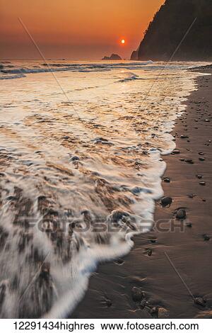 Sunrise and surf at Pololu Valley; Island of Hawaii, Hawaii, United States of America View Large Photo Image Stock Photograph - Sunrise and surf at Pololu Valley; Island of Hawaii, Hawaii, United States of America. Fotosearch