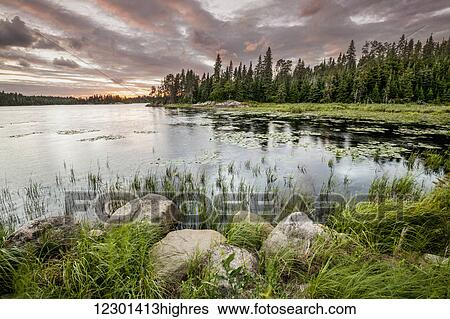 Sunset over a pond; Thunder Bay, Ontario, Canada View Large Photo Image Stock Photograph - Sunset over a pond; Thunder Bay, Ontario, Canada. Fotosearch