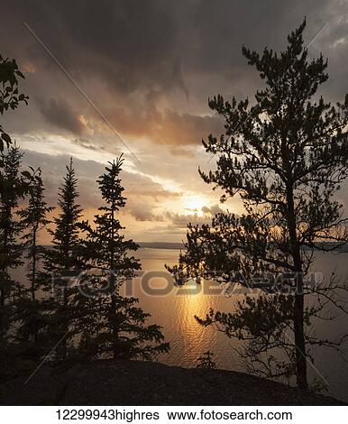 Stock Photograph - Sunset over Lake Superior; Thunder Bay, Ontario, Canada. Fotosearch
