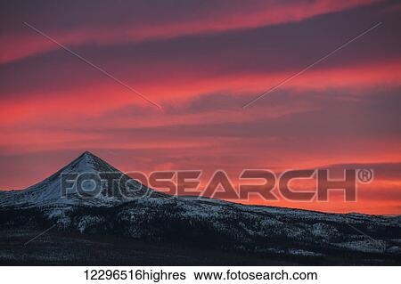 Sunset over the mountains; Yukon, Canada View Large Photo Image Stock Photograph - Sunset over the mountains; Yukon, Canada. Fotosearch