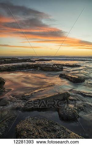 Sunset over the ocean near the city of Cape Town; South Africa View Large Photo Image Stock Image - Sunset over the ocean near the city of Cape Town; South Africa. Fotosearch