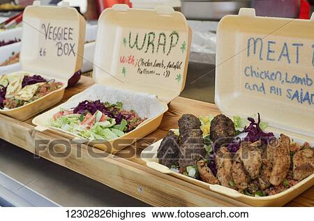 Take away food stall at Brick Lane Market, Shoreditch; London, England View Large Photo Image Stock Photograph - Take away food stall at Brick Lane Market, Shoreditch; London, England. Fotosearch