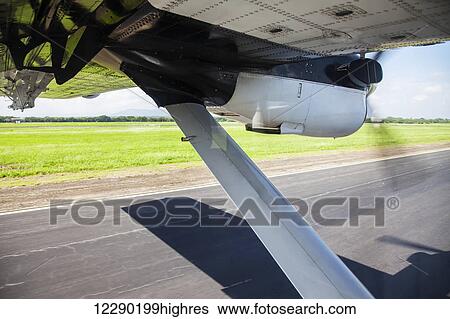 Stock Photograph - Taking off from Managua airport; Managua, Nicaragua. Fotosearch