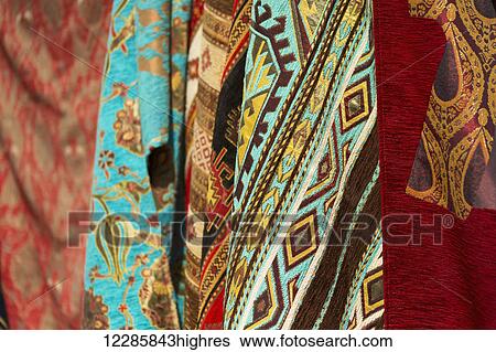 Textiles in open air market in the Greek town of Sinasos (Mustafapasa), near Cappadocia; Turkey View Large Photo Image Stock Photograph - Textiles in open air market in the Greek town of Sinasos (Mustafapasa), near Cappadocia; Turkey. Fotosearch