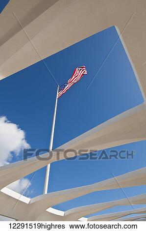 The American flag flies over the USS Arizona Memorial in Pearl Harbor; Oahu, Hawaii, United States of America View Large Photo Image Stock Photograph - The American flag flies over the USS Arizona Memorial in Pearl Harbor; Oahu, Hawaii, United States of America. Fotosearch