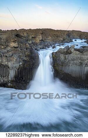 Stock Photograph - The basalt column and waterfall known as Aldeyjarfoss in Northern Iceland; Iceland. Fotosearch