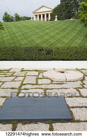 The Eternal Flame at the burial site of President John F. Kennedy at Arlington National Cemetery; Arlington, Virginia, United States of America View Large Photo Image Stock Photograph - The Eternal Flame at the burial site of President John F. Kennedy at Arlington National Cemetery; Arlington, Virginia, United States of America. Fotosearch