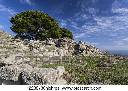 Stock Photograph - The foundation of the Great Altar of Zeus, the altar itself is in the Pergamon Museum in Berlin; Pergamum, Turkey. Fotosearch