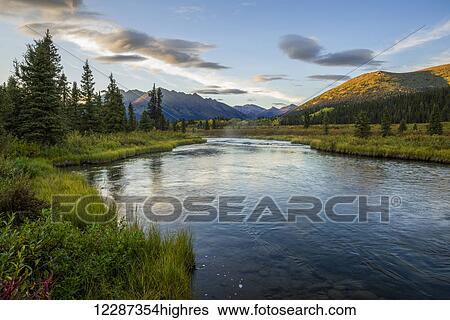 Stock Photograph - The Lapie River flows through the wilderness along the South Canol Road; Yukon, Canada. Fotosearch