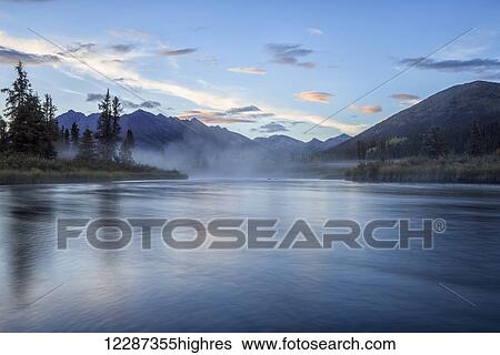The Lapie River flows through the wilderness along the South Canol Road; Yukon, Canada View Large Photo Image Stock Photograph - The Lapie River flows through the wilderness along the South Canol Road; Yukon, Canada. Fotosearch