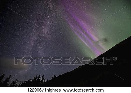 The Milky Way and aurora borealis meet in the sky near Girdwood, Southcentral Alaska. View Large Photo Image Stock Photograph - The Milky Way and aurora borealis meet in the sky near Girdwood, Southcentral Alaska.. Fotosearch