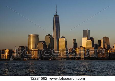 The new World Trade Center at sunset, viewed from Jersey City, New Jersey; New York City, New York, United States of America View Large Photo Image Stock Image - The new World Trade Center at sunset, viewed from Jersey City, New Jersey; New York City, New York, United States of America. Fotosearch