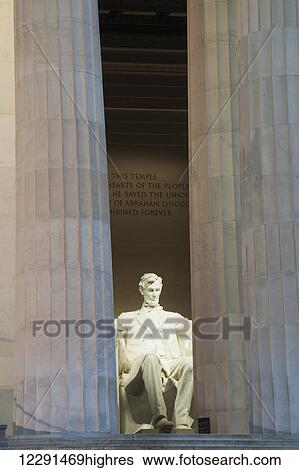The statue of Abraham Lincoln sits in solitude at the Lincoln Memorial; Washington, District of Columbia, United States of America View Large Photo Image Stock Photograph - The statue of Abraham Lincoln sits in solitude at the Lincoln Memorial; Washington, District of Columbia, United States of America. Fotosearch