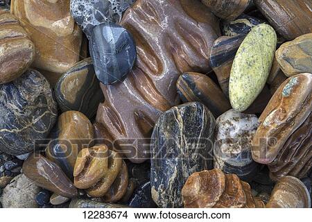 The various rocks that can be found along the Wind River, Peel Watershed; Yukon, Canada View Large Photo Image Picture - The various rocks that can be found along the Wind River, Peel Watershed; Yukon, Canada. Fotosearch