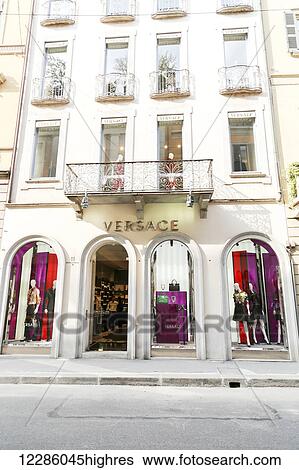 Stock Photograph - The Versace flagship store on Montenapoleone where many luxury designers have their boutiques; Milan, Italy. Fotosearch