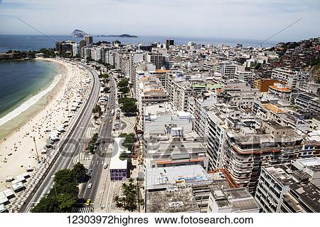 Stock Photograph - The view of Copacabana beach from above looking towards Ipanema; Rio de Janeiro, Brazil. Fotosearch