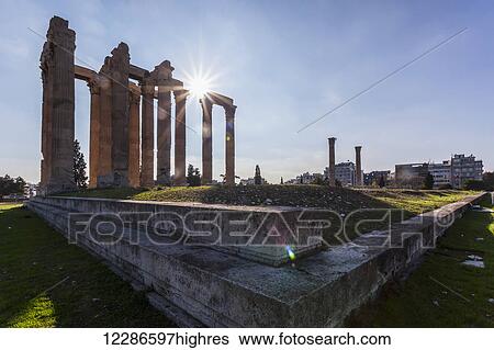 Stock Photograph - This Temple of Zeus, also known as the Olympieion, is an Greco-Roman temple in the centre of Athens; Athens, Greece. Fotosearch