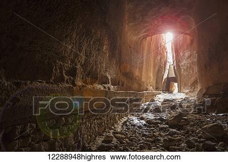 Titus' Tunnel cuts through the solid rock of the mountain in two places to provide a water channel to prevent flooding; Cevlik, Turkey View Large Photo Image Stock Photograph - Titus' Tunnel cuts through the solid rock of the mountain in two places to provide a water channel to prevent flooding; Cevlik, Turkey. Fotosearch