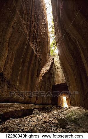 Titus' Tunnel cuts through the solid rock of the mountain in two places to provide a water channel to prevent flooding; Cevlik, Turkey View Large Photo Image Stock Photograph - Titus' Tunnel cuts through the solid rock of the mountain in two places to provide a water channel to prevent flooding; Cevlik, Turkey. Fotosearch