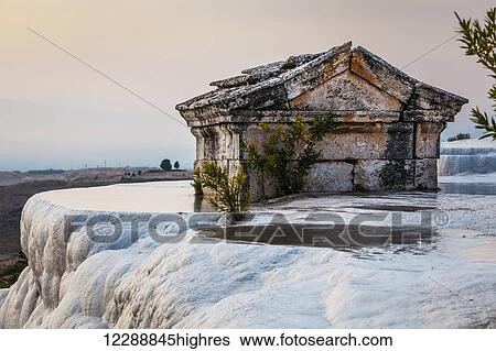 Stock Photograph - Tomb submerged in a travertine pool in Hierapolis; Pamukkale, Turkey. Fotosearch