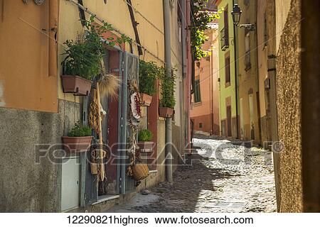 Traditional products hanging outside a shop; Bosa, Sardinia, Italy View Large Photo Image Stock Photograph - Traditional products hanging outside a shop; Bosa, Sardinia, Italy. Fotosearch