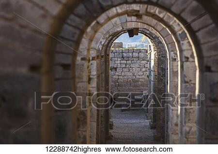 Stock Photograph - Tunnel between the Temple of Trajan and the Theatre on the Acropole; Bergama, Turkey. Fotosearch