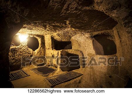 Stock Photograph - Tunnels and caves in the Kaymakli underground city; Kaymakli, Turkey. Fotosearch