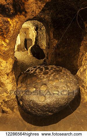 Stock Photograph - Tunnels and caves in the Kaymakli underground city; Kaymakli, Turkey. Fotosearch