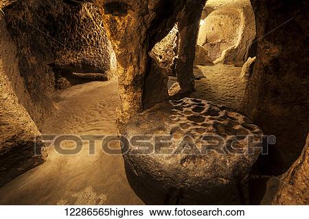 Stock Photograph - Tunnels and caves in the Kaymakli underground city; Kaymakli, Turkey. Fotosearch