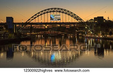 Tyne Bridge over River Tyne at sunset; Newcastle, Tyne and Wear, England View Large Photo Image Stock Photograph - Tyne Bridge over River Tyne at sunset; Newcastle, Tyne and Wear, England. Fotosearch