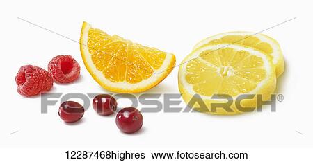 Stock Photograph - Variety of fruit on a white background; Toronto, Ontario, Canada. Fotosearch