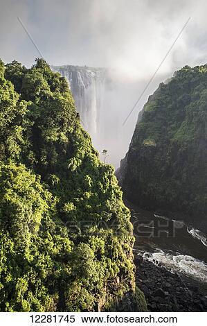 Victoria Falls; Livingstone, Zambia View Large Photo Image Stock Photography - Victoria Falls; Livingstone, Zambia. Fotosearch