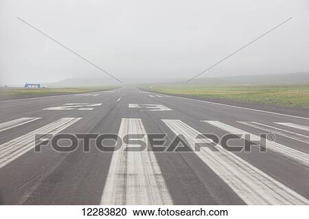 View down the runway of the St. Paul airport on a misty afternoon, St. Paul Island, Southwestern Alaska, USA, Summer View Large Photo Image Stock Image - View down the runway of the St. Paul airport on a misty afternoon, St. Paul Island, Southwestern Alaska, USA, Summer. Fotosearch