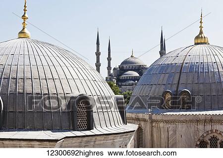 Stock Photograph - View of Blue Mosque from Aya Sofia window in Sultanahmet, old city of Istanbul; Istanbul, Turkey. Fotosearch