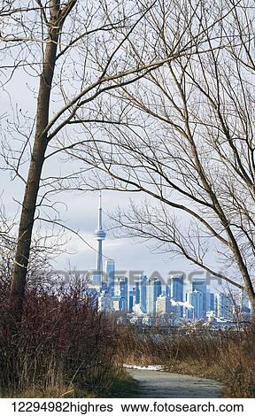 Stock Photograph - View of downtown Toronto from Tommy Thompson Park; Toronto, Ontario, Canada. Fotosearch