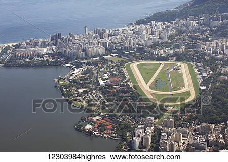 View of Jockey Club, Leblon and Rodrigo de Freitas Lake from Christ the Redeemer statue, Corcovado mountain, Tijaca National Park; Rio de Janeiro, Brazil View Large Photo Image Stock Photograph - View of Jockey Club, Leblon and Rodrigo de Freitas Lake from Christ the Redeemer statue, Corcovado mountain, Tijaca National Park; Rio de Janeiro, Brazil. Fotosearch