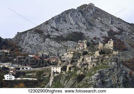 Stock Photograph - View of Pescosansonesco and a mountain peak; Pescara province, Abruzzi region, Italy. Fotosearch