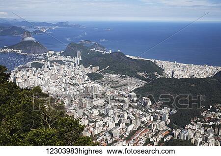 View of Rio and Sugarloaf Mountain from Christ the Redeemer statue, Corcovado mountain, Tijaca National Park; Rio de Janeiro, Brazil View Large Photo Image Stock Photograph - View of Rio and Sugarloaf Mountain from Christ the Redeemer statue, Corcovado mountain, Tijaca National Park; Rio de Janeiro, Brazil. Fotosearch