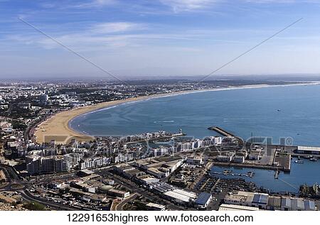 View of town, beach and Agadir bay taken from Kasbah; Agadir, Morocco View Large Photo Image Stock Photograph - View of town, beach and Agadir bay taken from Kasbah; Agadir, Morocco. Fotosearch
