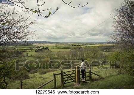 Walking in the English countryside; Tring, Borough of Dacorum, Hertfordshire, England View Large Photo Image Stock Photograph - Walking in the English countryside; Tring, Borough of Dacorum, Hertfordshire, England. Fotosearch