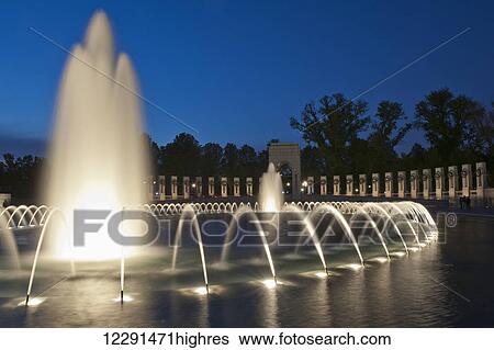 Stock Photograph - Waterfall at twilight at the World War II Memorial; Washington, District of Columbia, United States of America. Fotosearch