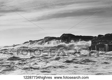 Waves splashing against rocks; Tofino, British Columbia, Canada View Large Photo Image Stock Photograph - Waves splashing against rocks; Tofino, British Columbia, Canada. Fotosearch