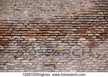 Stock Photograph - Weathered brick wall; Rome, Italy. Fotosearch