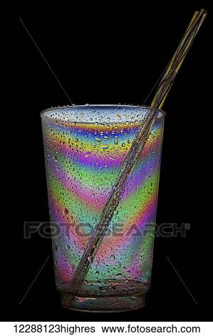Wet glass with straws (cross-polarised) View Large Photo Image Stock Photograph - Wet glass with straws (cross-polarised). Fotosearch