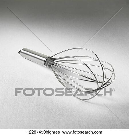 Stock Photograph - Whisk on a white background; Toronto, Ontario, Canada. Fotosearch