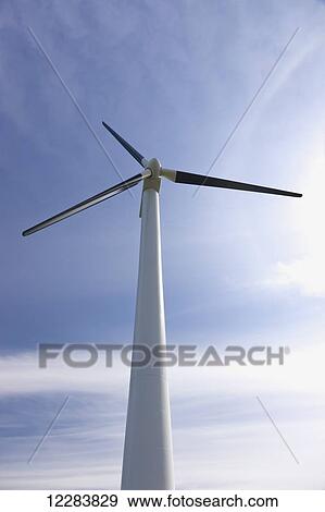Stock Photo - Wind turbine against a partly sunny sky, Sand Point, Southwestern Alaska, USA, Summer. Fotosearch