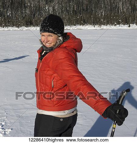 Young woman cross country skiing in Yoho National Park; Field, British Columbia, Canada View Large Photo Image Stock Photograph - Young woman cross country skiing in Yoho National Park; Field, British Columbia, Canada. Fotosearch