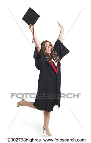 Young woman holding her hands up in celebration of her graduation; Edmonton, Alberta, Canada View Large Photo Image Stock Photograph - Young woman holding her hands up in celebration of her graduation; Edmonton, Alberta, Canada. Fotosearch