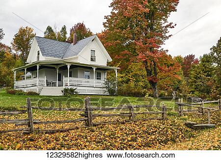Stock Photograph - 19th Century Farmhouse In Autumn; Dunham, Quebec, Canada. Fotosearch